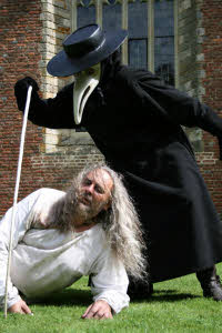 A dying victim and plague doctor